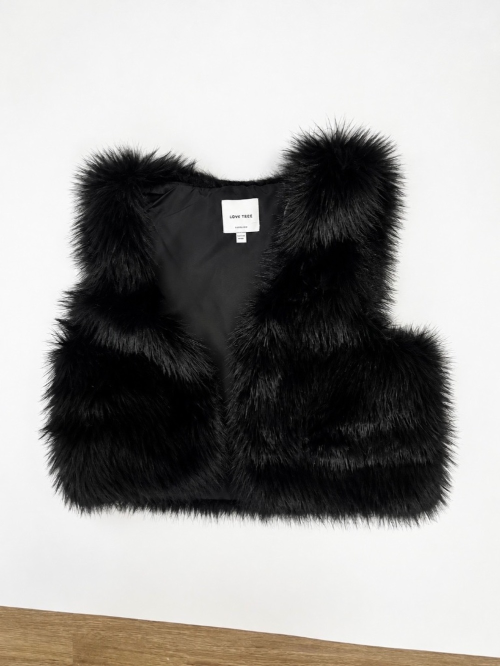 Black fur vest